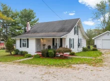 Discover the charm of this adorable farmhouse paired with a cozy tiny home