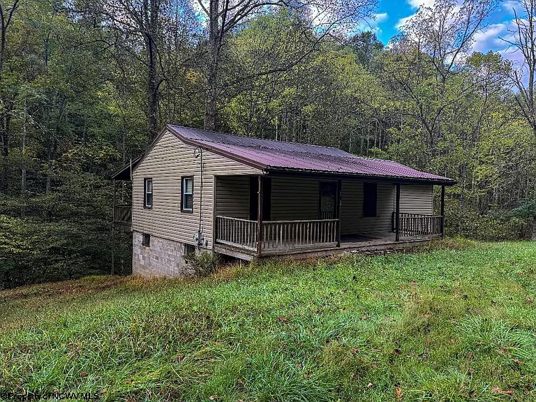 39 Acres with 3-Bedroom Cabin and Creek – $130,000