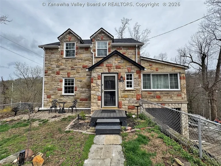 Classic 1944 Stone & Block Mid-Century Home in Charleston with Spacious Layout, Fireplaces & Walkout Basement