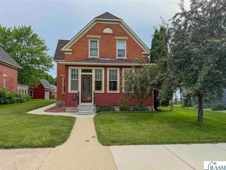 Charming 1898 Brick Home Showcases Original Woodwork, Stained Glass, and Timeless Character in New Ulm Listed for $173,000