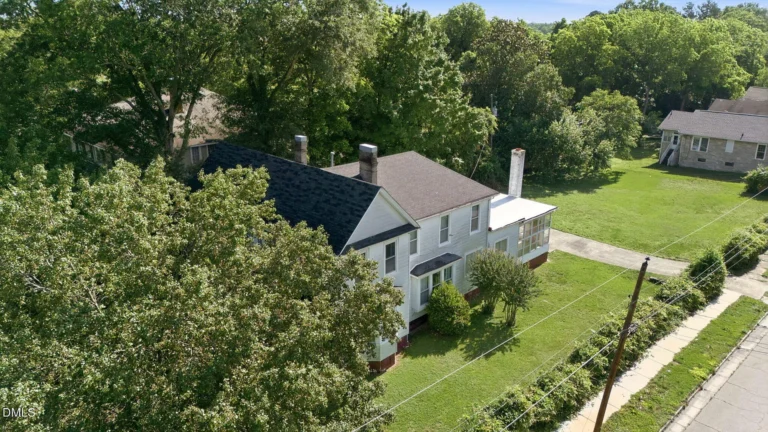 Historic 1912 Colonial Offers Over an Acre of Space and Timeless Character in Henderson