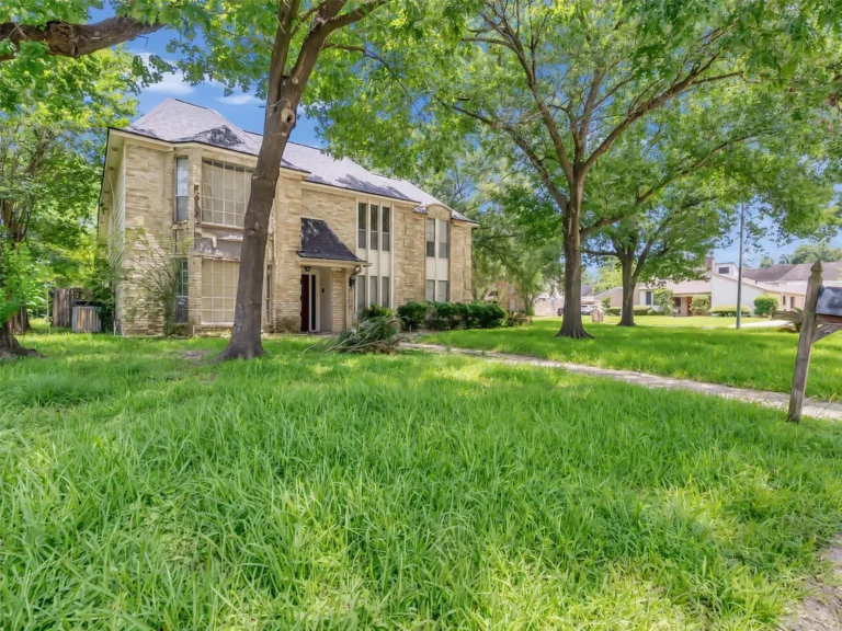 Grand Houston Estate with Exceptional Potential on an Oversized Corner Lot Listed for $210,000