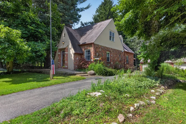 Classic 1932 Brick Tudor on a Picturesque Wooded Estate in Jackson, Michigan Listed for $285,000