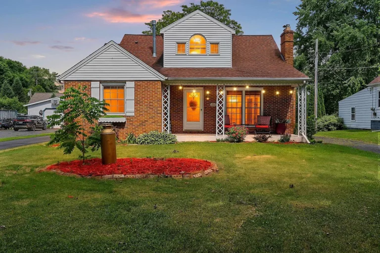 Charming Lake Winnebago Waterfront Home with Sandy Shoreline and Stunning Views