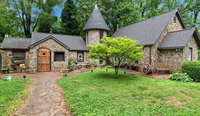 $400K North Carolina Castle Home Features a Two-Story Turret, Stone Exterior and 3 Bedrooms