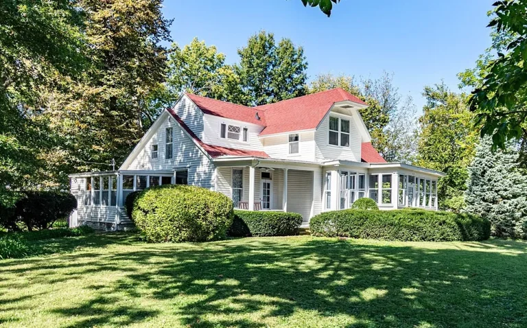 $139,000 Classic Two-Story Home with Historic Charm and Detached Carriage House in Illiopolis, Illinois